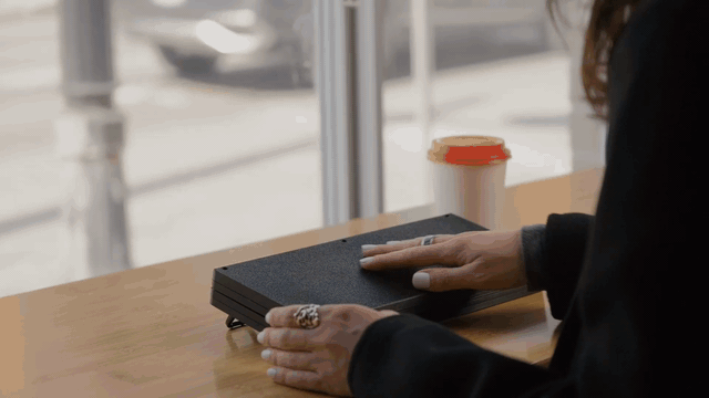 Zerowriter Fold opening at a cafe